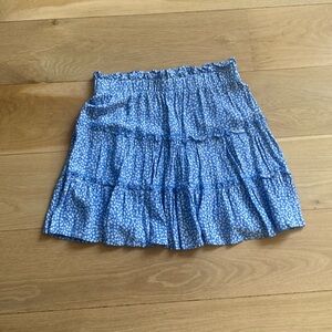 a blue and white flower skirt